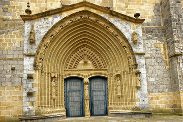 Fototapeta premium Ornate entryway to the 15th Century A.D. Church of Santa Maria in Guernica, Basque Country, Northern Spain