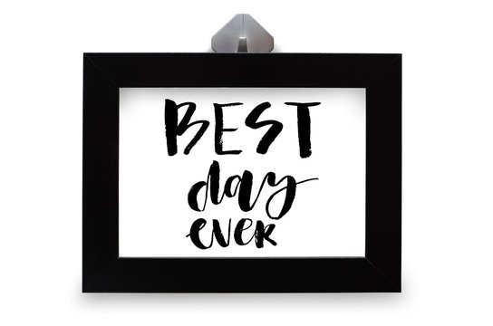 Best day ever. Handwritten text. Modern calligraphy. Inspirational quote in black wooden frame
