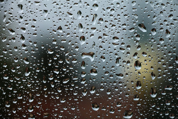 Rain drops on window , rainy day 