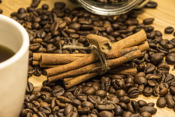Cinnamon with coffee beans 
