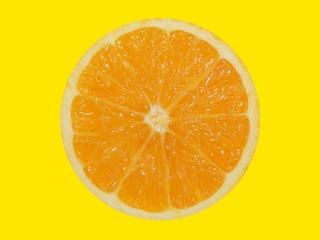 Fototapeta na wymiar orange slice isolated on a yellow background
