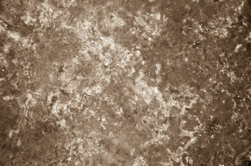 Old metal background or vintage abstract texture. Sepia.