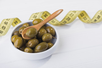 olives in white bowl