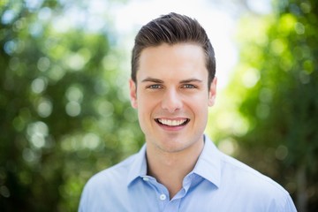 Portrait of man in park