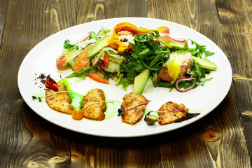 Fried fish and salad mix