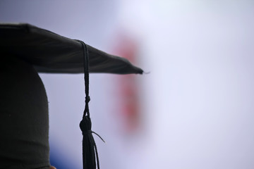 Man in a graduation cap  - obrazy, fototapety, plakaty