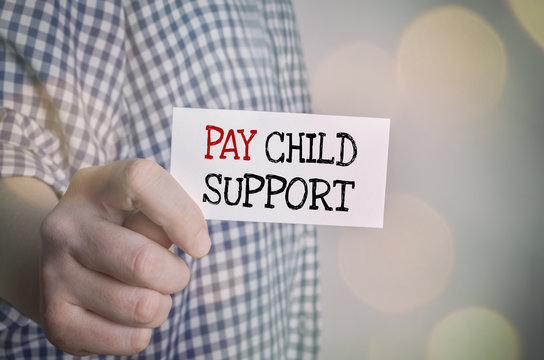 Man showing Pay child support card. Family and care concept.