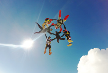 Sky diving group formation low angle view - 140691082
