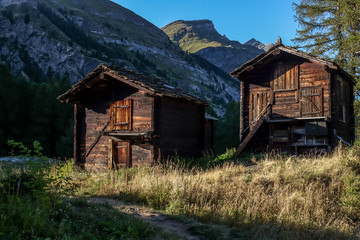 Typical old Swiss wooden huts, near Zermatt, Switzerland.
