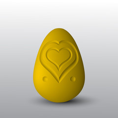 A golden egg with a heart cut out on it.
