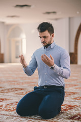 Modest Muslim praying