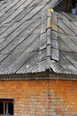 Very old damaged asbestos slate roof 