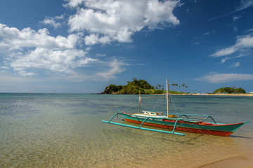 A boat on the shore of one of the Twin beaches near El Nido, Palawan, Philippines