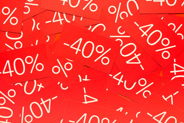 Discounts 40 percent. Background with red tags with percentages and discounts