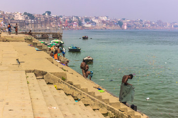 October 31, 2014: People of Varanasi taking a bath in the Ganga river, India