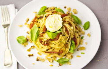 Spaghetti sun dried tomatoes basil mozzarella