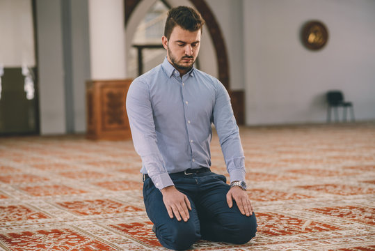 Muslim adult praying in a temple