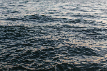 Ripples on blue water.