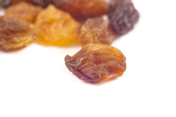 Dried grape raisins background, close up