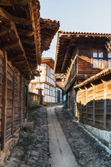 Narrow street and traditional houses in Kotel, Bulgaria