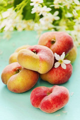 Saturn doughnut flat peaches