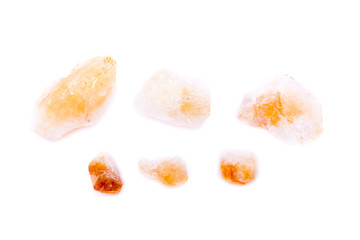 Macro mineral of Citrine stone on white background