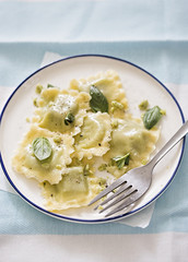 Basil raviolis with olive oil
