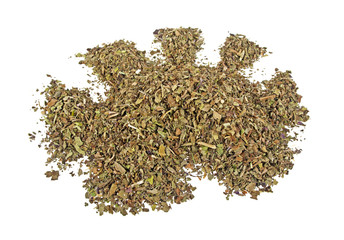 Pile of dried basil spice isolated on white background