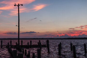 Sunset over docks in Chesapeake Bay.