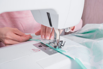 hands sew clothes