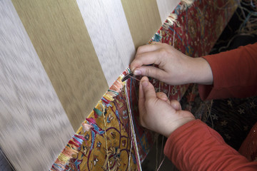 manual production of carpets