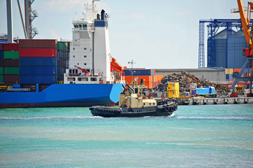 Tugboat and port cargo crane