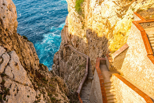 Stairs To Neptunes Grotto (Italian Grotta Di Nettuno), Stalactite Cave Near The Town Of Alghero On The Island Of Sardinia, Italy