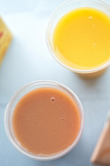 Strawberry banana and orange mango smoothie