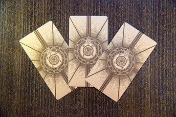 Tarot cards on the wood. Labirinth tarot deck. Esoteric background.
