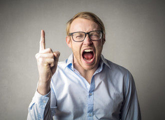 Shouting man pointing his finger