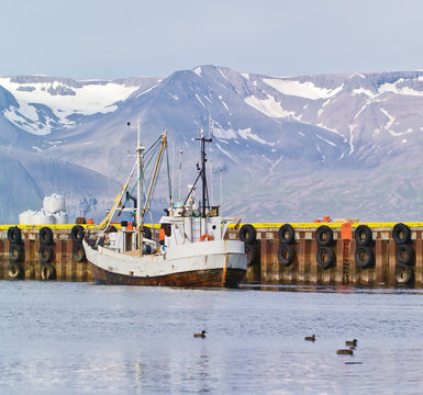 Fototapeta Fishing schooner in the port of Reykjavik city, Iceland