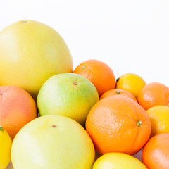 Citrus fruits - lemon, orange, grapefruit, sweetie and pomelo on white background.