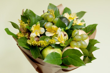 Bouquet of fruits and flowers