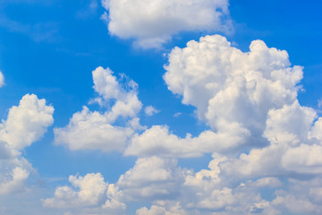 Naklejka na ściany i meble Blue sky with clouds in a summer sunny day