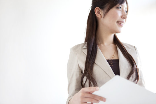 Businesswoman holding a file