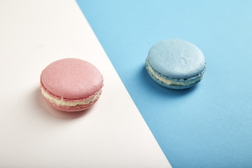 french colorful macarons on colorful background