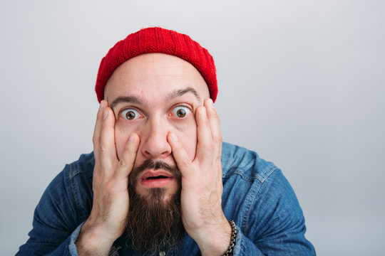 Portrait of scared man