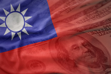 colorful waving national flag of taiwan on a american dollar money background. finance concept © luzitanija