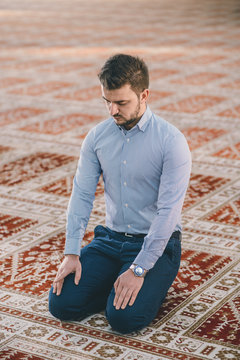 Muslim praying humbly in a mosque
