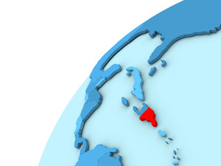 Dominican Republic in red on blue globe