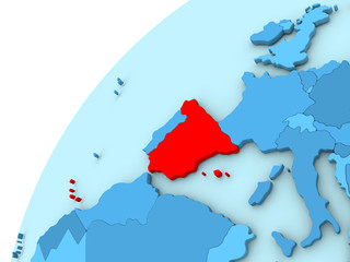 Spain in red on blue globe