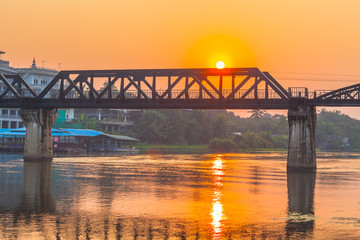 Fototapeta na wymiar sunrise above River Kwai bridge