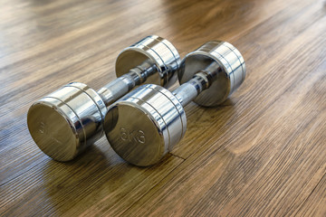 A Pair of Dumbells in a Sport Fitness Room