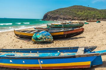 Wide view of group of fishing boats parked in seashore with sea background, Visakhapatnam, Andhra Pradesh, March 05 2017